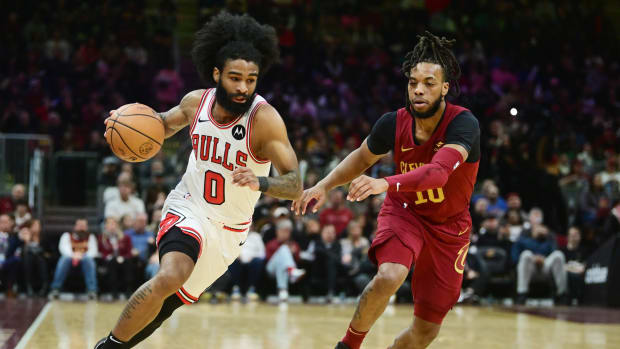 Chicago Bulls guard Coby White (0) drives to the basket against Cleveland Cavaliers guard Darius Garland (10) during the second half at Rocket Mortgage FieldHouse. 